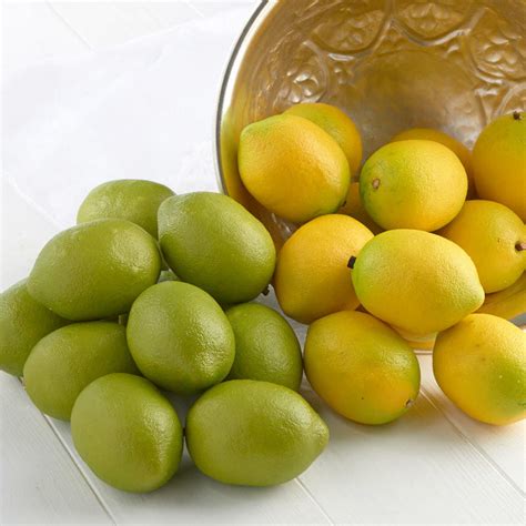 bag of fake lemons|decorative lemons and limes.